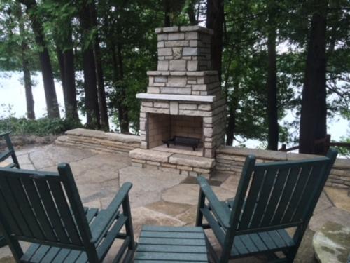 Outdoor fireplace with chairs (1)